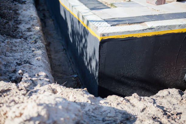 Professional Waterproofing technician working in Fulton, IL
